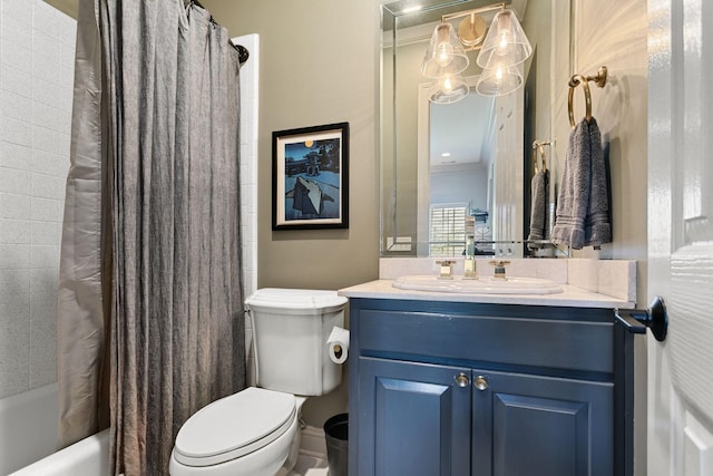 full bathroom featuring crown molding, vanity, shower / bath combo with shower curtain, and toilet