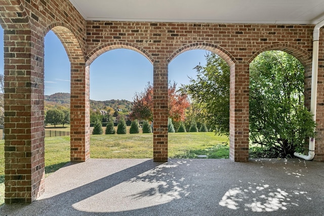 view of patio / terrace with a mountain view