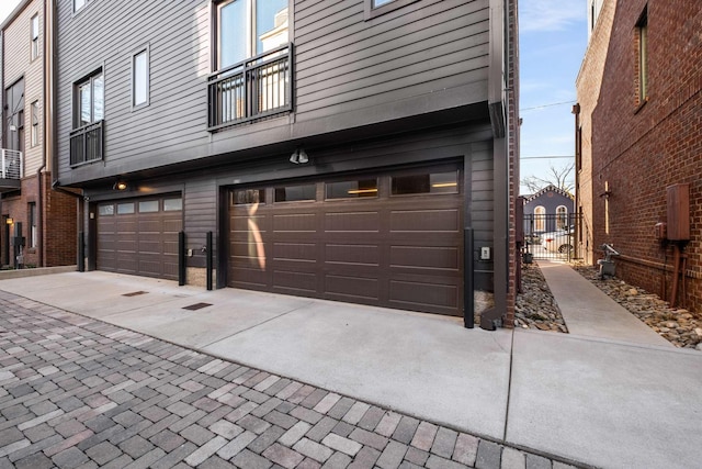 garage featuring driveway