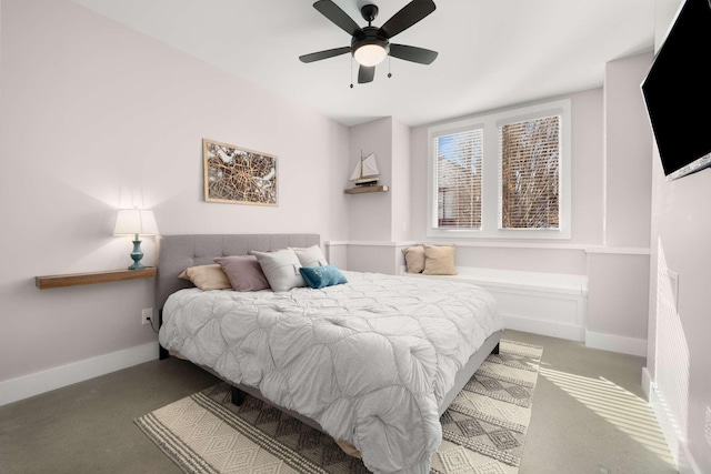 bedroom featuring baseboards and a ceiling fan