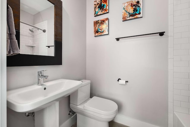 bathroom with a sink and toilet