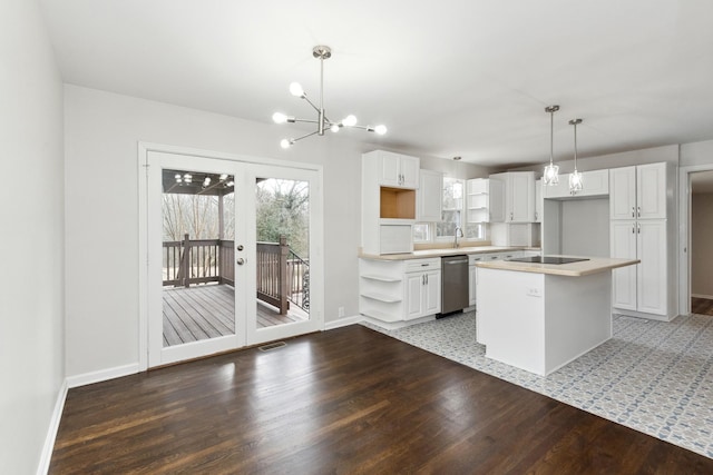 kitchen with decorative light fixtures, a chandelier, a center island, stainless steel dishwasher, and white cabinets