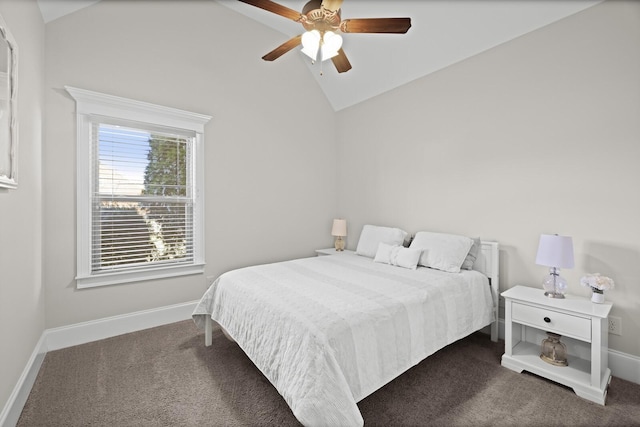 bedroom featuring ceiling fan, lofted ceiling, and dark carpet