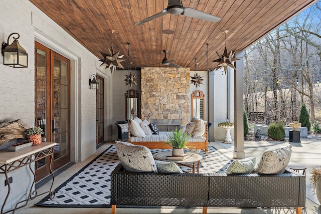 view of patio with ceiling fan and outdoor lounge area