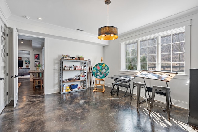 dining area with ornamental molding