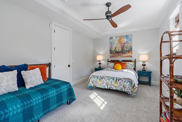 carpeted bedroom featuring ceiling fan