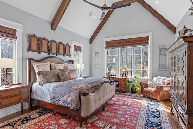 bedroom featuring beam ceiling, wood-type flooring, high vaulted ceiling, and ceiling fan