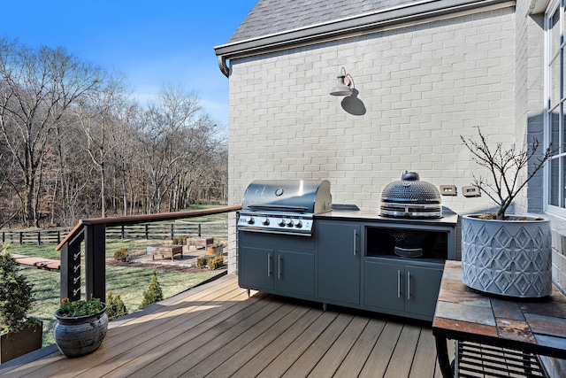 deck featuring area for grilling and grilling area