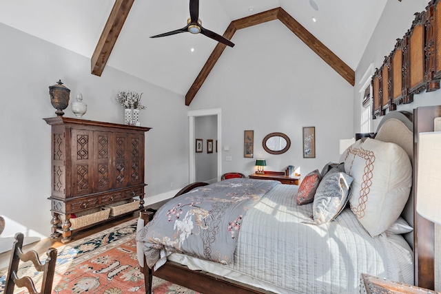 bedroom with beamed ceiling, ceiling fan, hardwood / wood-style flooring, and high vaulted ceiling