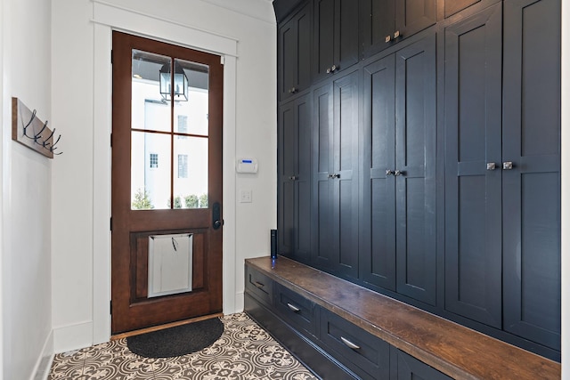 mudroom with tile patterned flooring