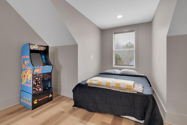 bedroom with light hardwood / wood-style floors