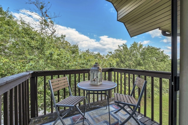 wooden balcony featuring a wooden deck