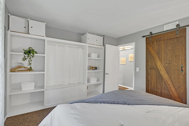 bedroom with a barn door