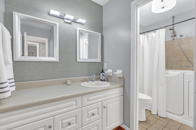 full bathroom with tile patterned floors, toilet, shower / tub combo, and vanity