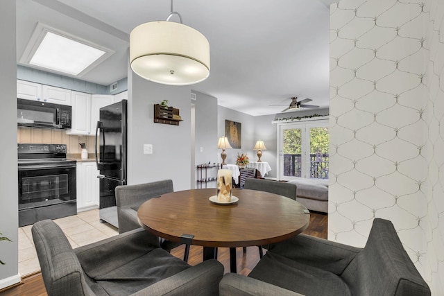 dining space featuring ceiling fan