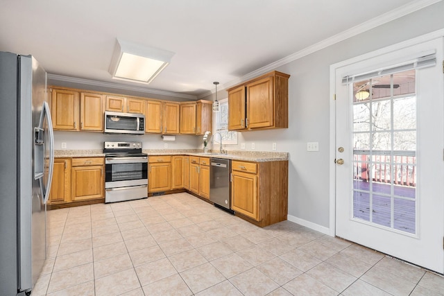 kitchen with pendant lighting, sink, stainless steel appliances, light stone counters, and ornamental molding