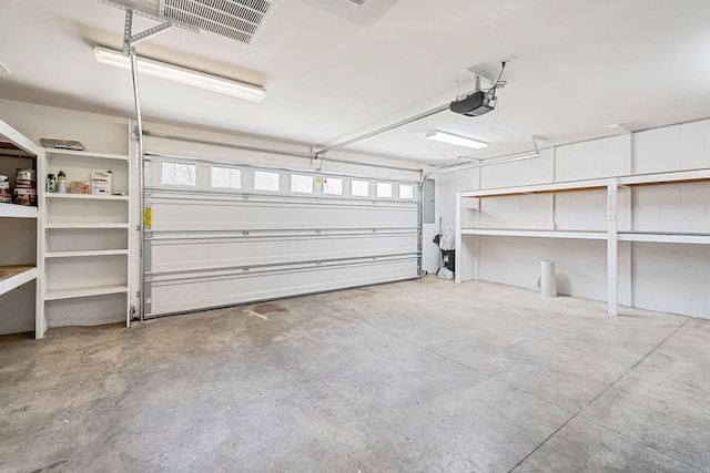 garage featuring a garage door opener