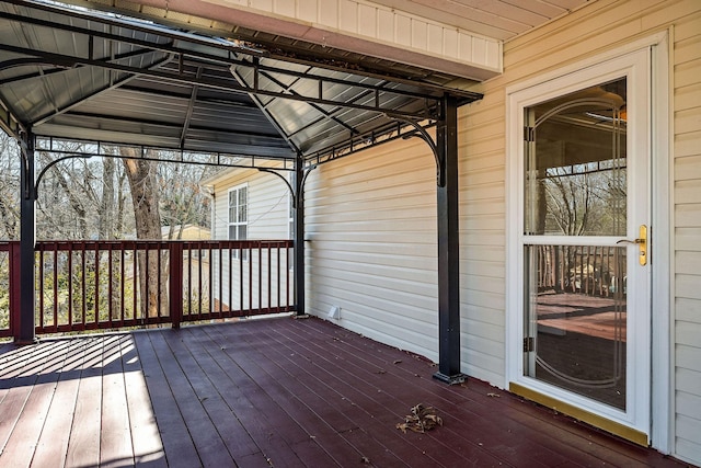 wooden deck featuring a gazebo