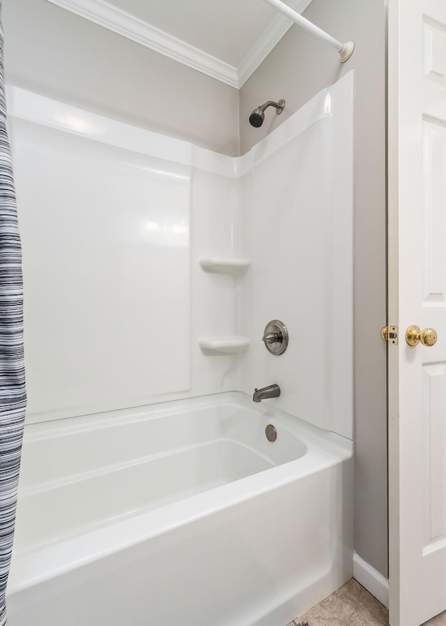 bathroom with tile patterned flooring, crown molding, and shower / bath combo with shower curtain