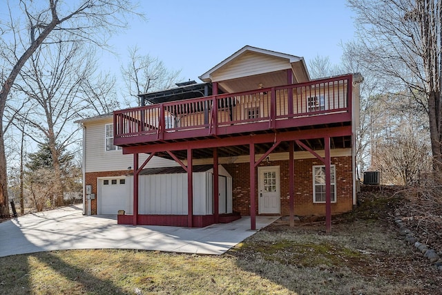 view of front of property featuring a garage and a deck