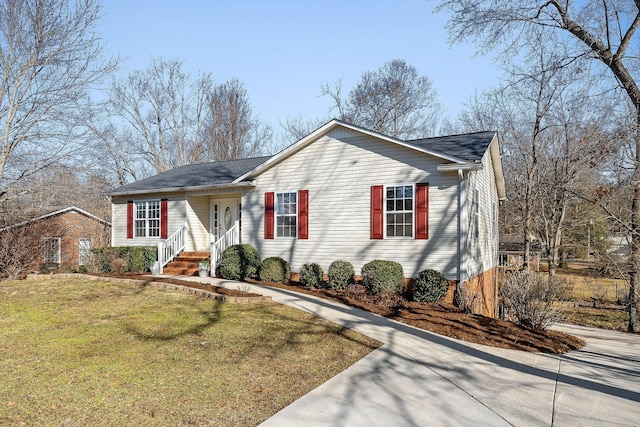 single story home with a front yard