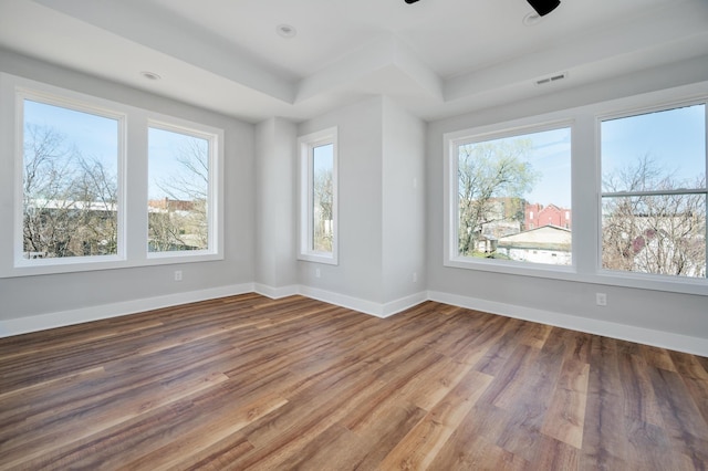 empty room featuring hardwood / wood-style floors