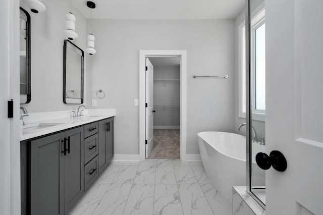 bathroom with vanity and separate shower and tub