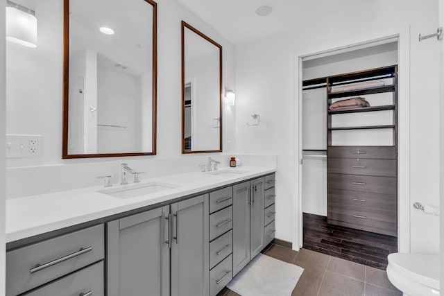 bathroom with vanity and tile patterned floors