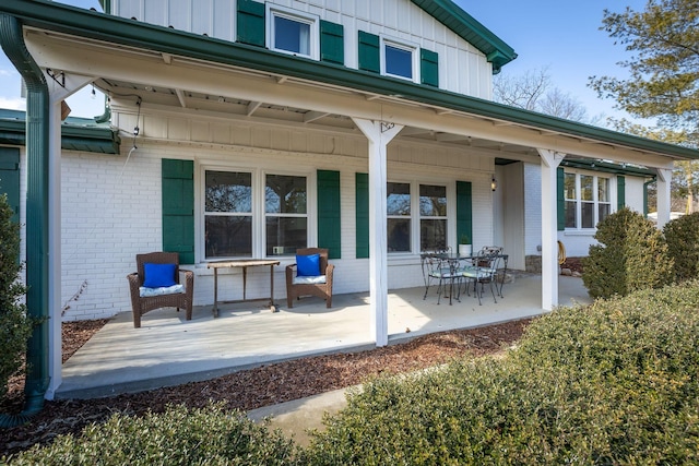 rear view of property featuring a patio