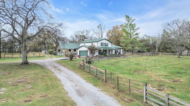 view of front of home featuring a rural view and a front yard