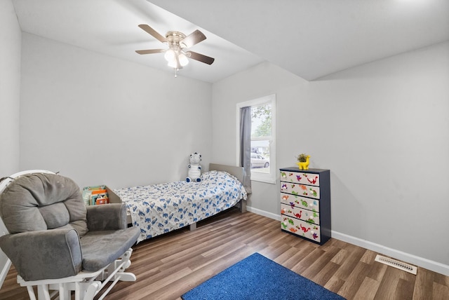 bedroom featuring ceiling fan and wood-type flooring