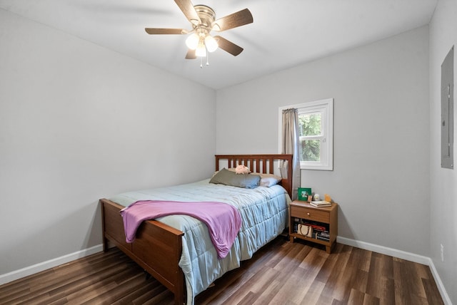 bedroom featuring ceiling fan and dark hardwood / wood-style floors