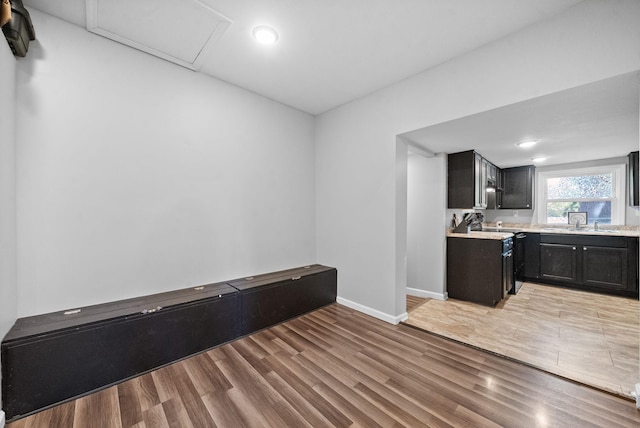 interior space with sink and light wood-type flooring