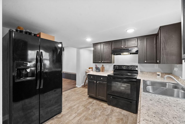 kitchen with sink, dark brown cabinets, and black appliances