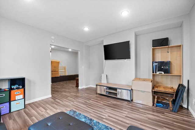 living room with hardwood / wood-style flooring