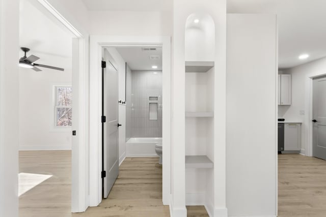 hall featuring light hardwood / wood-style flooring