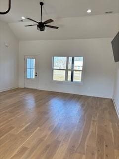 bonus room featuring hardwood / wood-style flooring, lofted ceiling, and ceiling fan