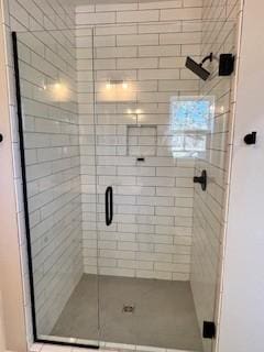 bathroom with an enclosed shower