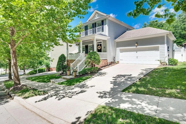 view of front facade featuring a porch and a garage