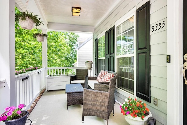 balcony featuring a porch