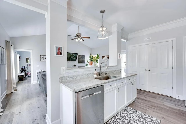 kitchen with sink, white cabinetry, dishwasher, pendant lighting, and light stone countertops