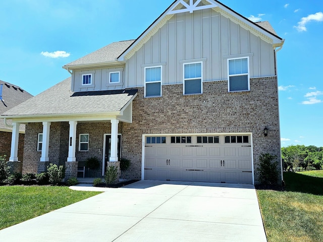 craftsman-style house with a garage, a porch, and a front yard