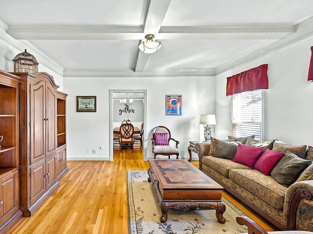 living room with beamed ceiling, crown molding, a chandelier, and light hardwood / wood-style flooring