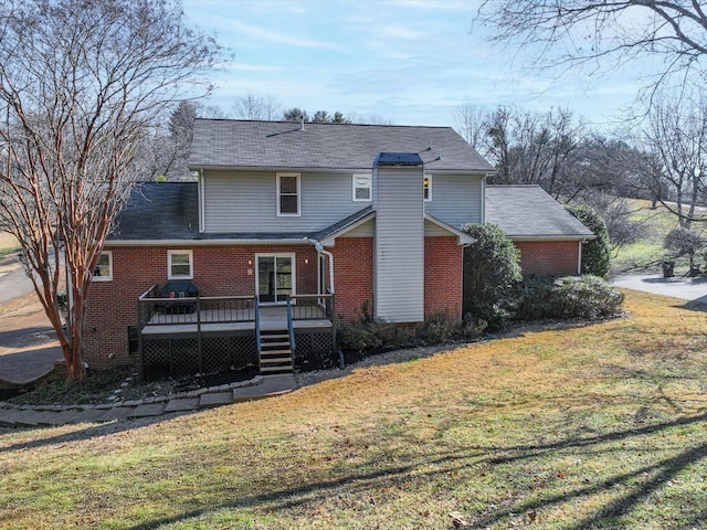 exterior space with a wooden deck and a front yard