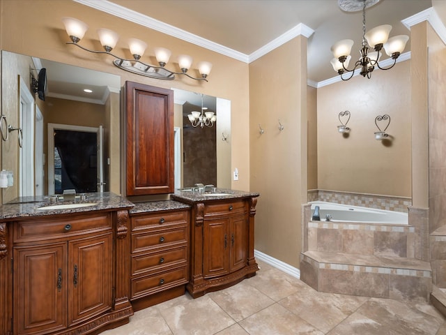 bathroom with tiled tub, an inviting chandelier, vanity, ornamental molding, and tile patterned floors