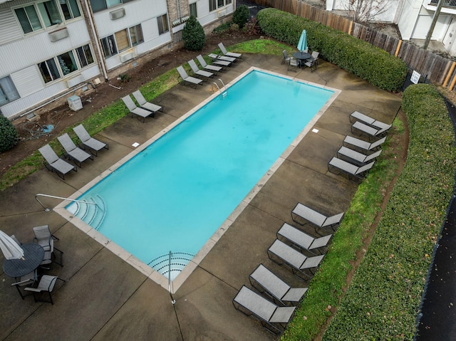 view of pool featuring a patio