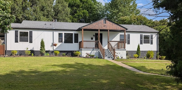32 Jones Cir, Old Hickory, TN 37138 - view of front of property with covered porch, a front lawn, a shingled roof, and crawl space
