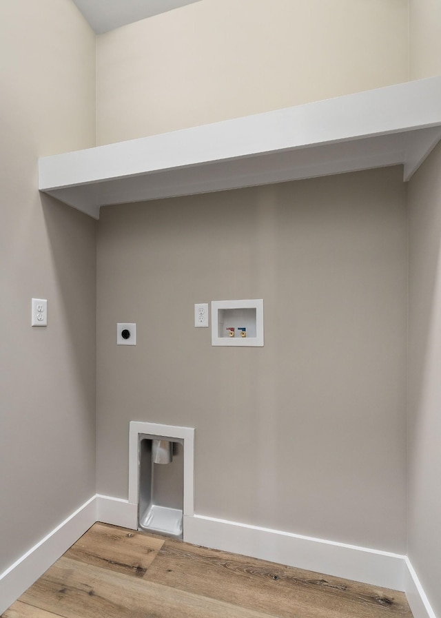 laundry room with hardwood / wood-style floors, washer hookup, and hookup for an electric dryer