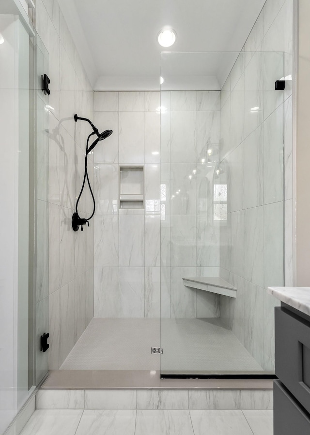 bathroom featuring vanity and walk in shower