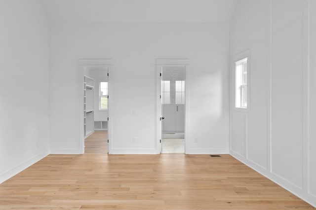 spare room featuring light hardwood / wood-style flooring